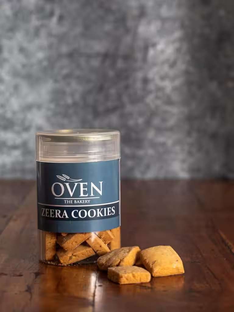 OVEN jeera cookies in a branded jar