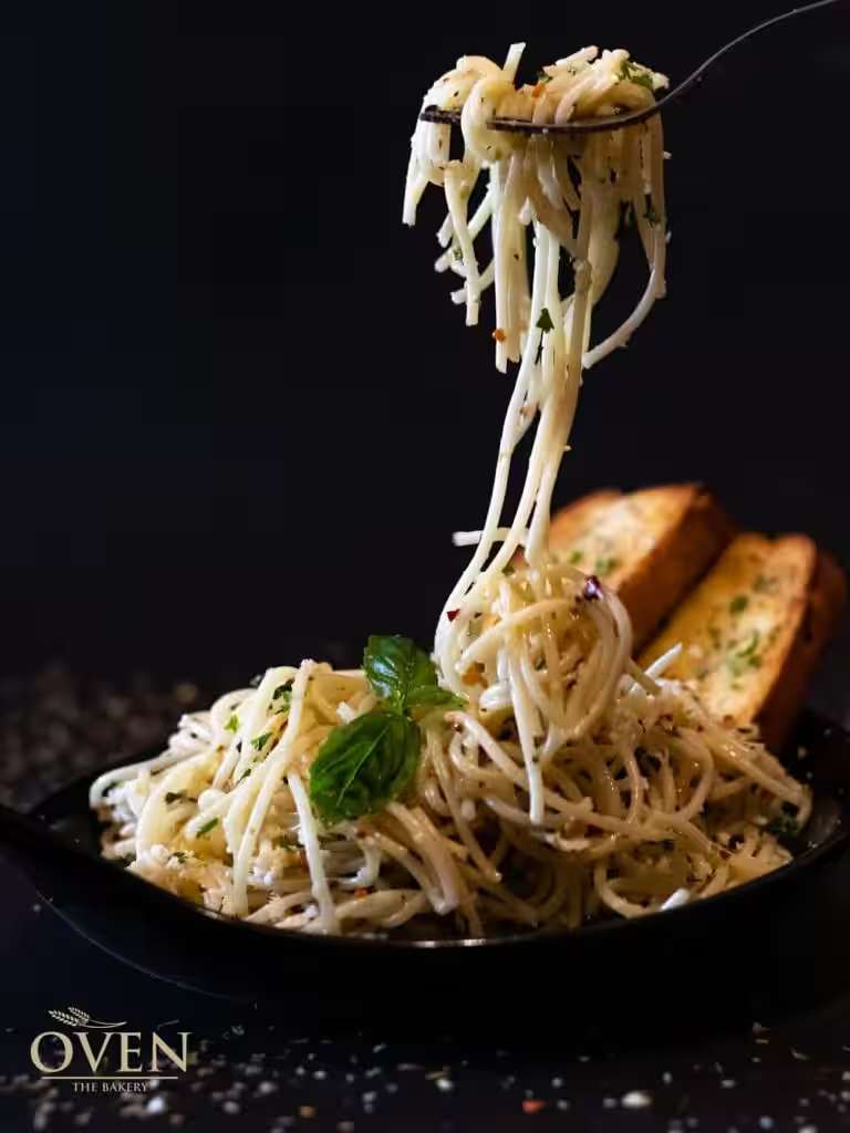 Pasta lifted from the pan